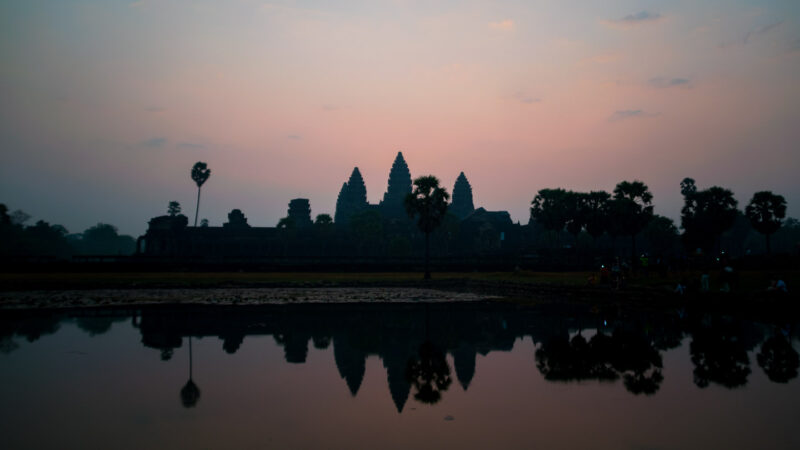 Pink and Blue Swirling sunrise at Angkor Wat - Best places to stand for sunrise Angkor Wat