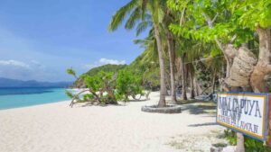 white sand beach of Malcapuya Island near Coron in the Palawan