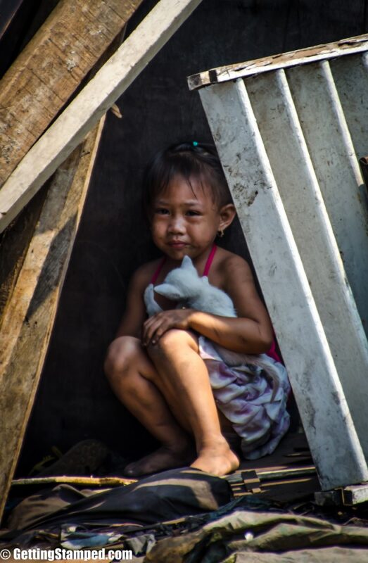 little girl in Smoky mountain slum of Manila 