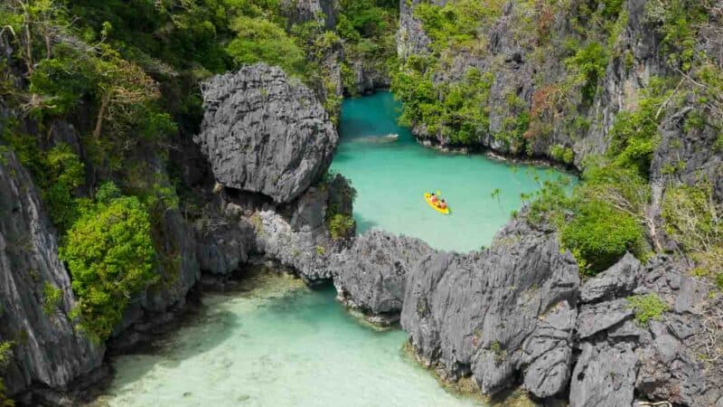 Yellow Kayak in Small Lagoon in El Nido's Miniloc Island on Day Tour A