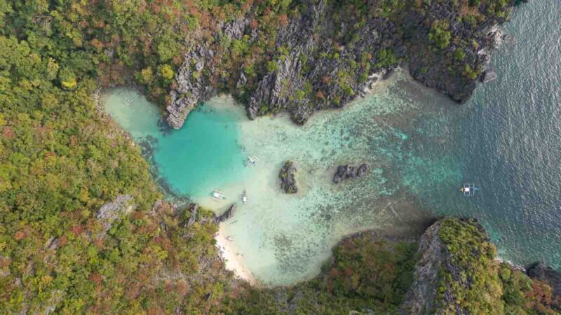 Top down aerial view of Cadlao Lagoon Tour D El Nido Palawan with turquoise pools of water
