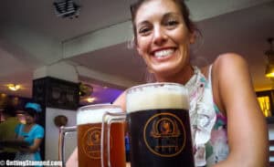 Girl drinking Vietnamese beers in Hoi An Vietnam