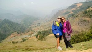 couple trekking in Sapa Vietnam - Hiking in Local Villages and rice terraces