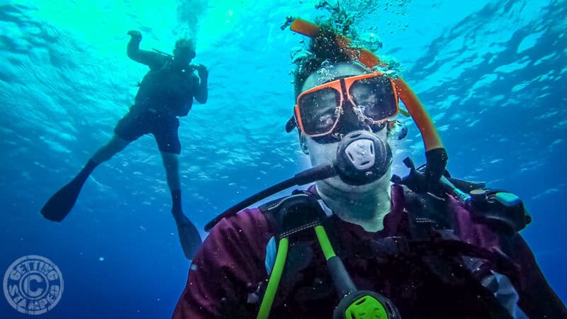 man diving at Sandals Ochi in Jamaica 