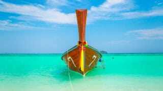 Koh Lipe - Home Page Slider - Long Tail boat Getting Stamped