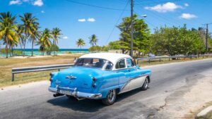 Playa Jibacoa Cuba Blue Old American Chevy Drives