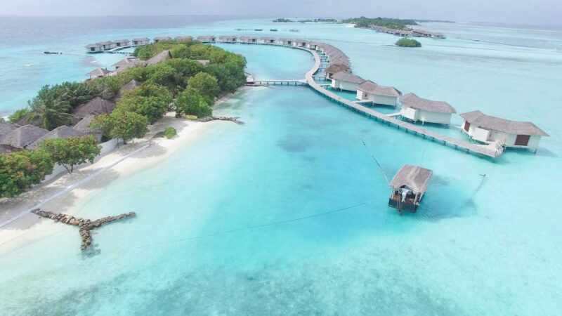 Aerial view of the overwater bungalows at Cinnamon Dhonveli Maldives