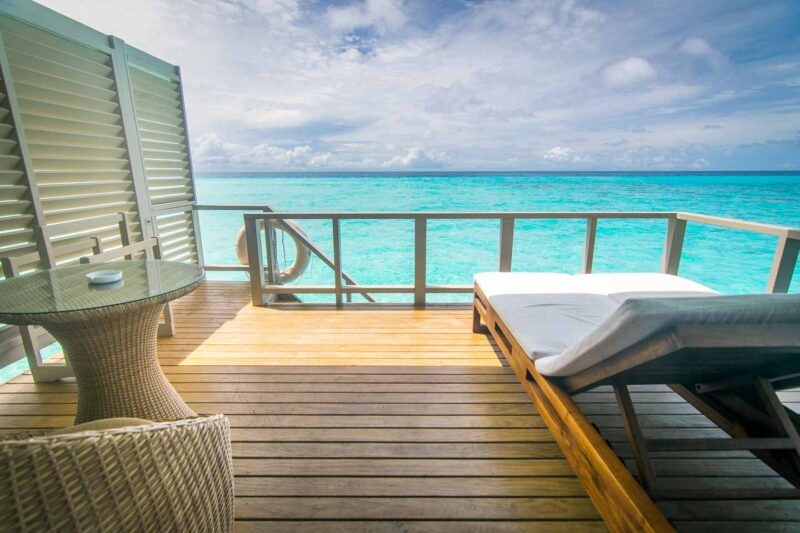 private balcony right out to the ocean in an over the water bungalow at Summer Island Maldives