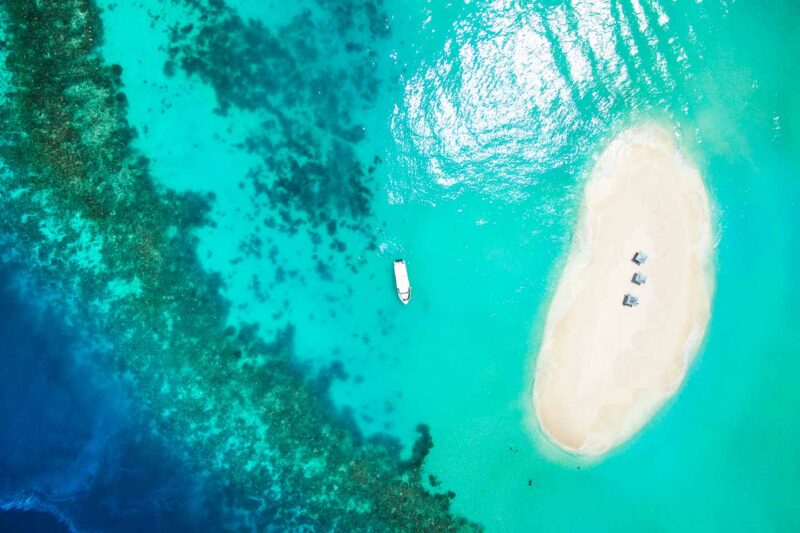 Sandbank island in the Maldives shot from above with a drone
