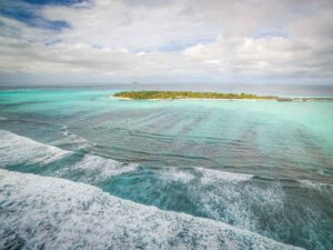 Summer Island Maldives entire island shot from DJI Phantom drone