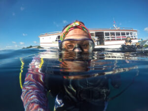 girl snorkeling in Wakatobi Indoenesia
