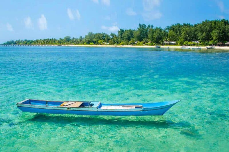 Boat in the water by Hoga Island Wakatobi Indonesia