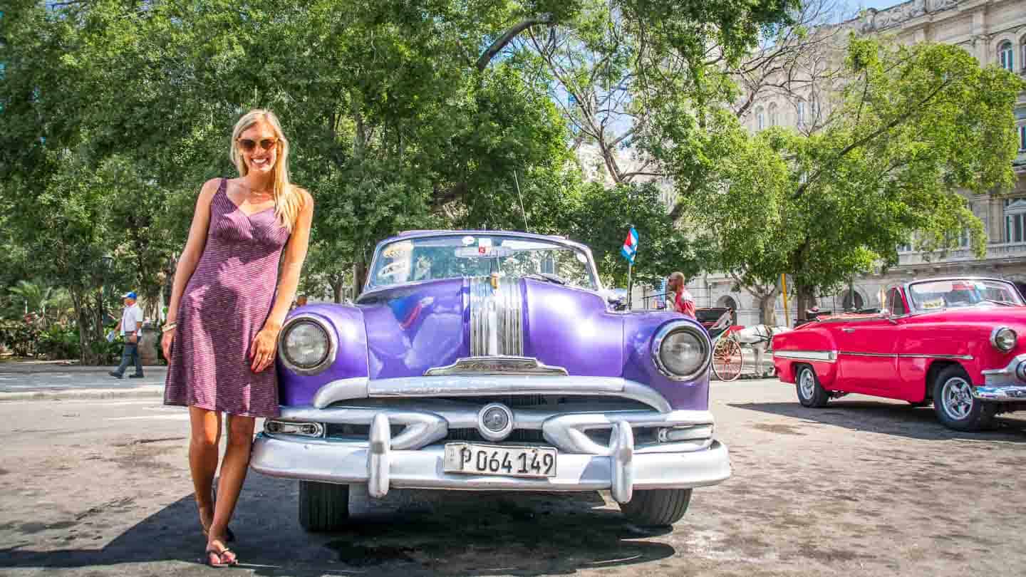 Best Places In Cuba Havana Hannah Car Getting Stamped Leaning On Purple Clic Car In Cuba