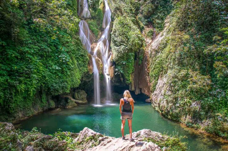 Things to do in Cuba - girl looking at Vegas Grande Topes de Collantes waterfall in Cuba