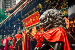 Chinese Lions guard the Sik Sik Temple in Kowloon on of the best sights to see