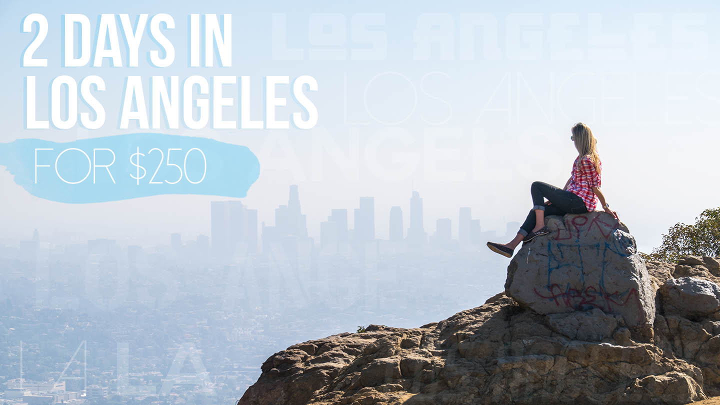 Two days in LA on a budget - feature image with woman looking at LA skyline from Griffith Park