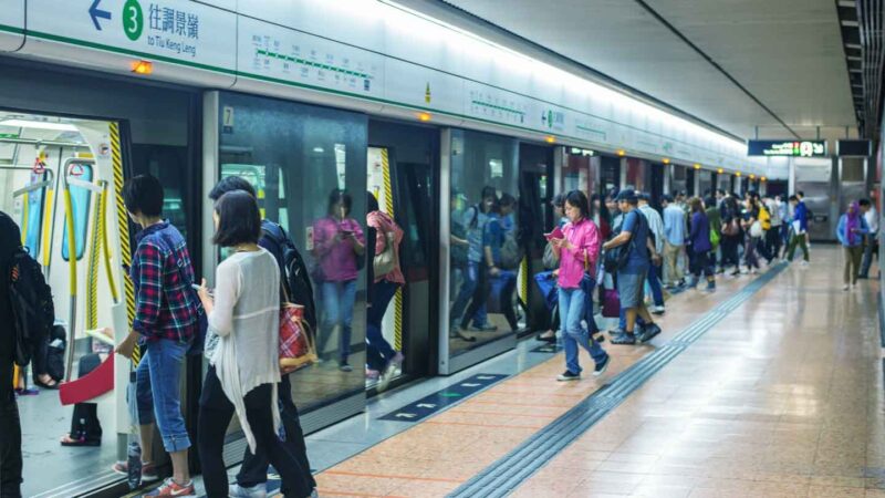 Hong Kong MRT subway train with people getting on