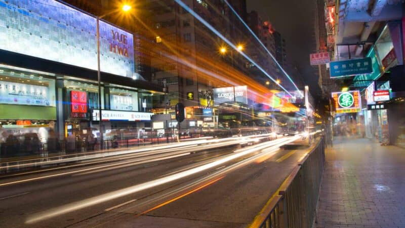 Traffic streaks at night in Kowloon Hong Kong at night busy street traffic