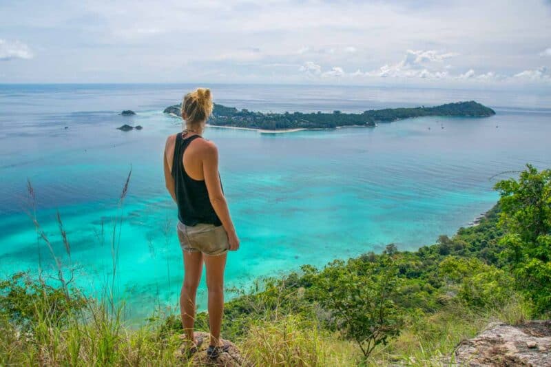 girl standing at the top o Koh Adang viewpoint looking at Koh Lipe