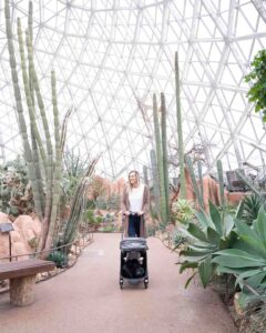 Woman walking through the Mitchell Park Domes - Top things to do in Milwaukee