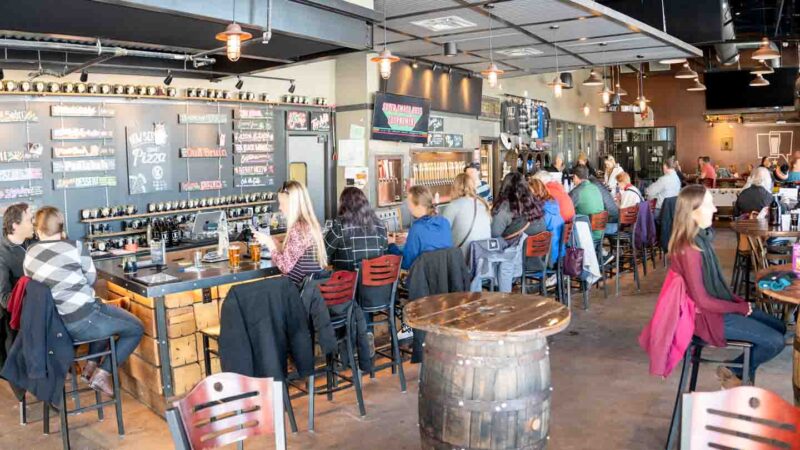 view of the taproom at MobCraft Beer - Brewery in Milwaukee - Things to do on a weekend in Milwaukee