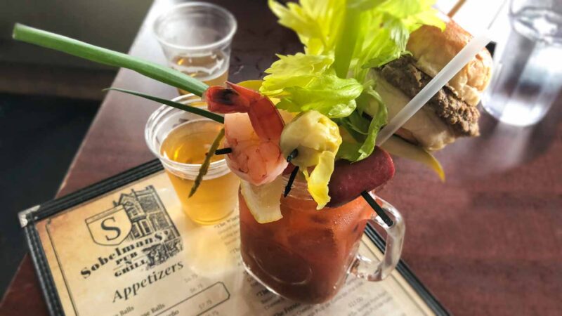 Sobelman's Bloody Mary with beef stick, shrimp, cheese - Best places to eat in Milwaukee