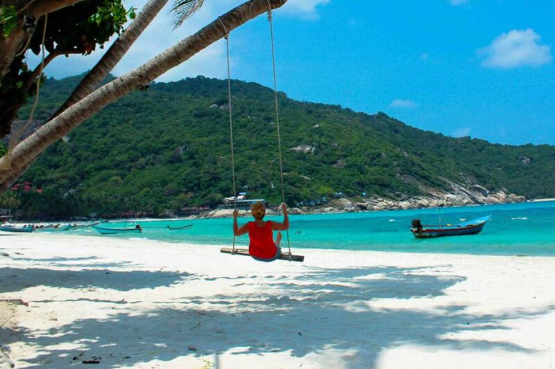 Koh Phangan Thailand girl on a swing