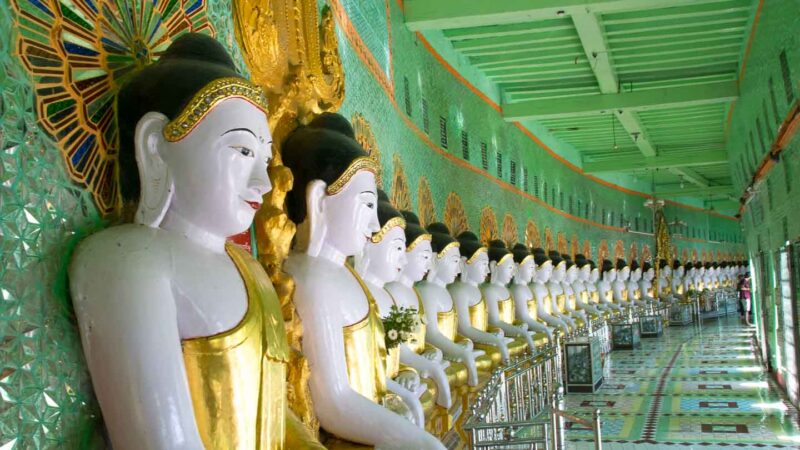 Many gold cover Buddha statues in the 30 caves Pagoda in Mandalay Myanmar - Top Attractions 