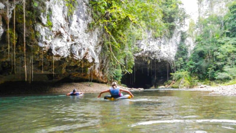 Woman cave tubing in Belize 