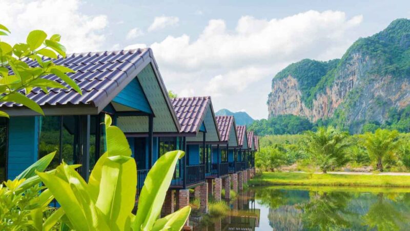 Baannai Lake View Resort Thailand with mountain backdrop