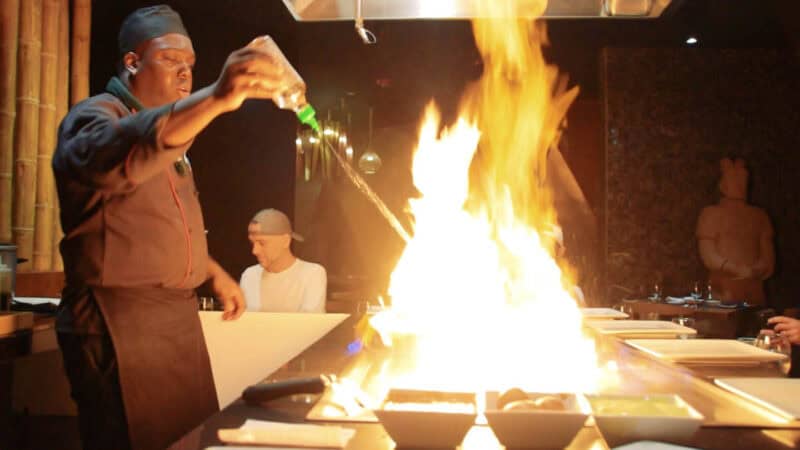Chef preparing food at the Momo Restaurant at the moon palace grande 