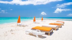 Lunge chairs setup for the guests of Sandy island in Anguilla