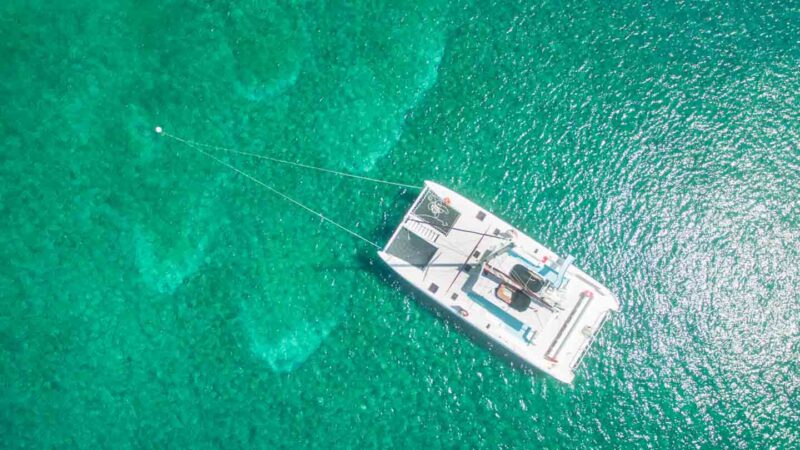 Boat anchored off of Negril in Jamaica ready for a tour 