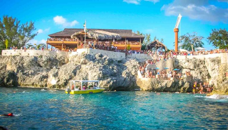 Top things to do in Negril Jamaica is cliff jumping from Rick's Cafe 