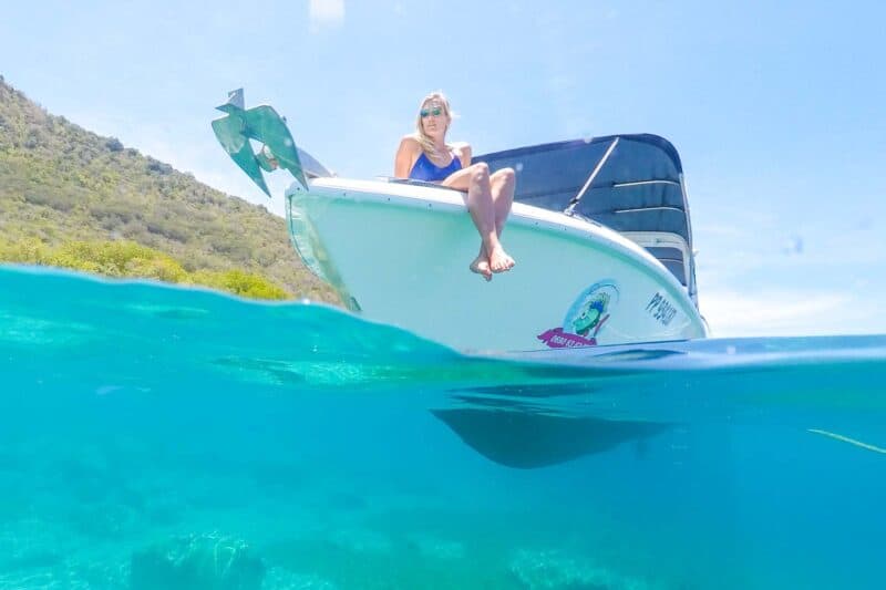 girl on a boat in Guadeloupe, over under dome shot