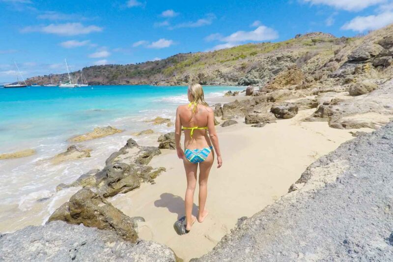 girl walking on the beach in St Barts
