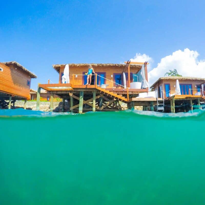 women on the deck of the overwater villa at Sandals St. Lucia Grande