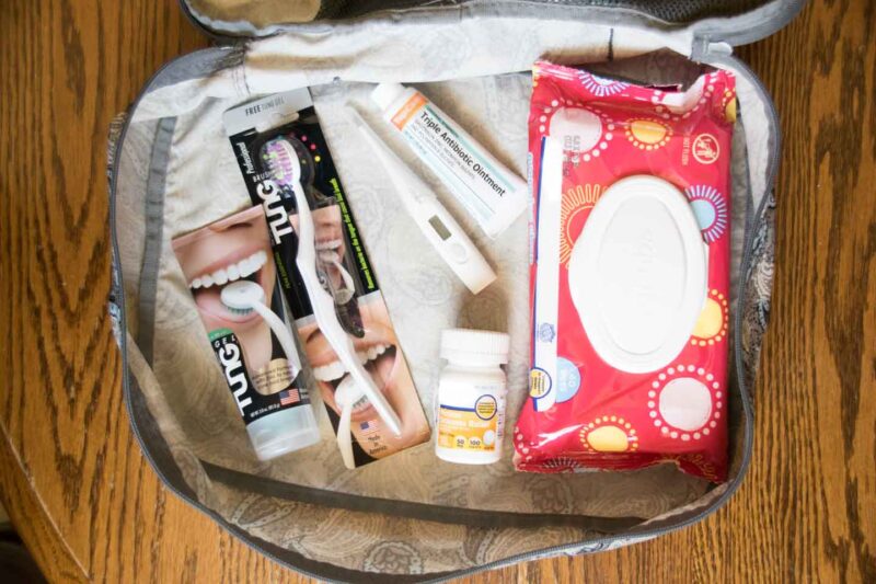 5 must have items inside of a travel toiletry bag