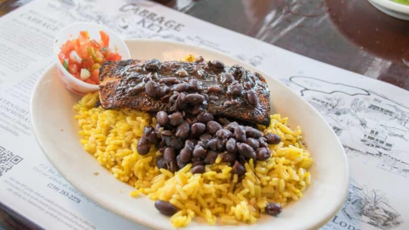 Fresh Mahi Mahi served over rice and beans at Cabbage Key one of the best things to do in Fort Myers