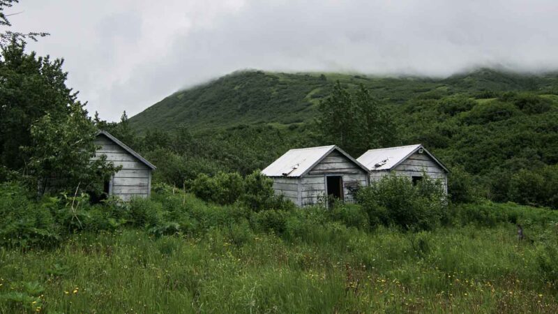 Old White mining buildings at the start of the golden mint trail at Hatcher Pass in Alaska