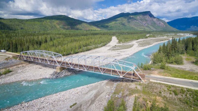 Bridge over a glacier fed river in the yukon on the route to Alaska