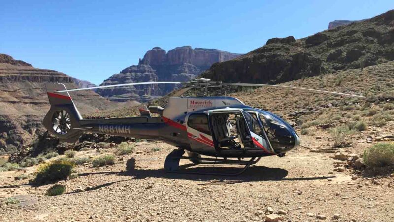 Maverick helicopter landed in the Grand Canyon on a helicopter Tour