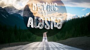 featured image for driving to Alaska long strech of road with steep down hill in the mountains