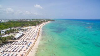 The beach in Playa del Carmen in front of Elements condos and vacation rentals