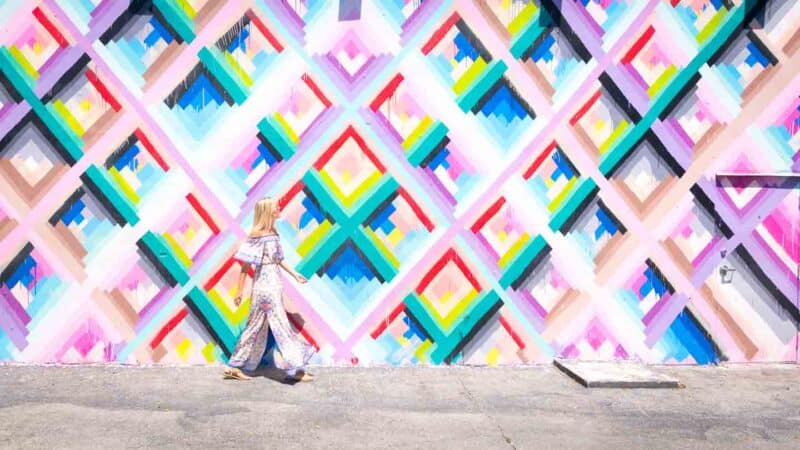 girl walking by Wynwood Walls Miami