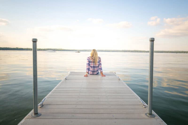 Girl on the pier in Green Lake Wisconsin 