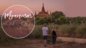 featured image for Myanmar Honeymoon couple walking in front of the temples of Bagan
