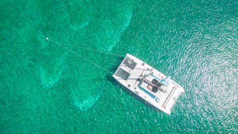 Catamaran on a mooring line during a catamaran trip in Jamaica - top things to do Honeymoon in Jamaica