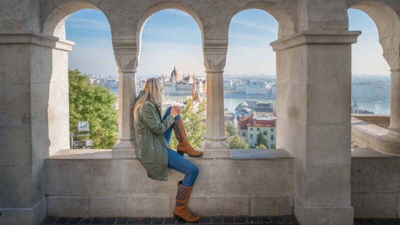 Woman in the Fisherman's bastion in Budapest wearing boots