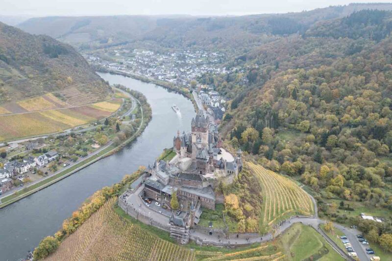 Cochem Castle surrounded by hills and valley with Moselle River